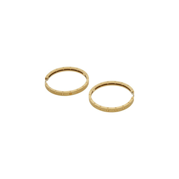 Arracadas diseño especial con rubíes firma Roberto Coin en oro amarillo 18 kilates.