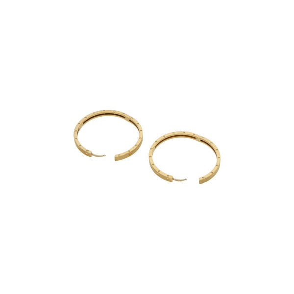 Arracadas diseño especial con rubíes firma Roberto Coin en oro amarillo 18 kilates.