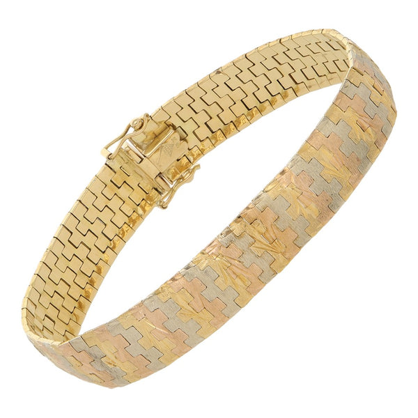 Pulsera eslabón articulado en oro tres tonos 18 kilates.