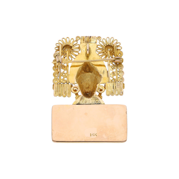 Dije diseño especial motivo prehispánico en oro amarillo 14 kilates.