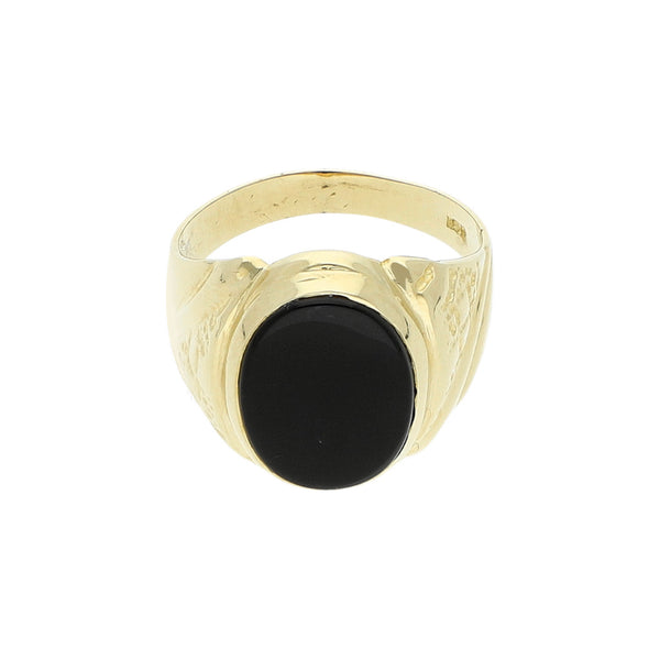 Anillo tipo sello labrado con ónix en oro amarillo 14 kilates.