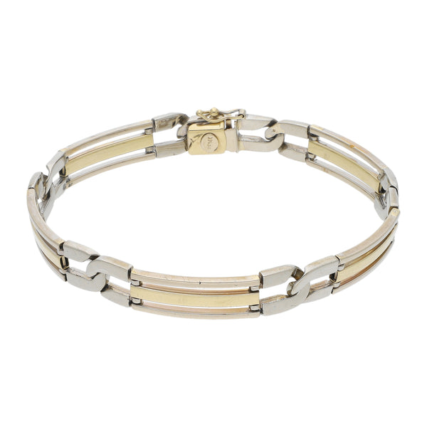 Pulsera eslabón articulado en oro dos tonos 14 kilates.