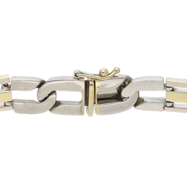 Pulsera eslabón articulado en oro dos tonos 14 kilates.