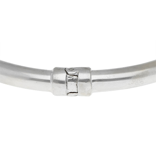 Pulsera de arillo articulada con circonias en oro blanco 18 kilates.