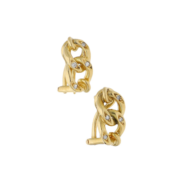 Aretes calados con diamantes en oro amarillo 18 kilates.