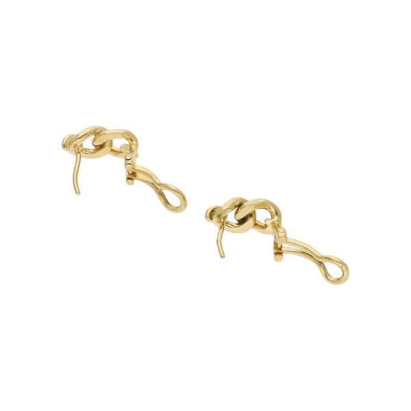 Aretes calados con diamantes en oro amarillo 18 kilates.