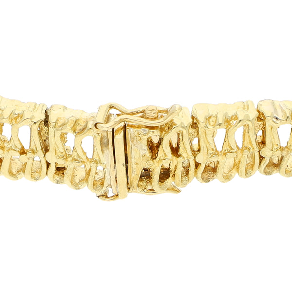 Pulsera eslabón calado en oro amarillo 18 kilates.