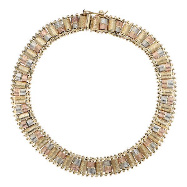 Pulsera eslabón boleado en oro tres tonos 14 kilates.