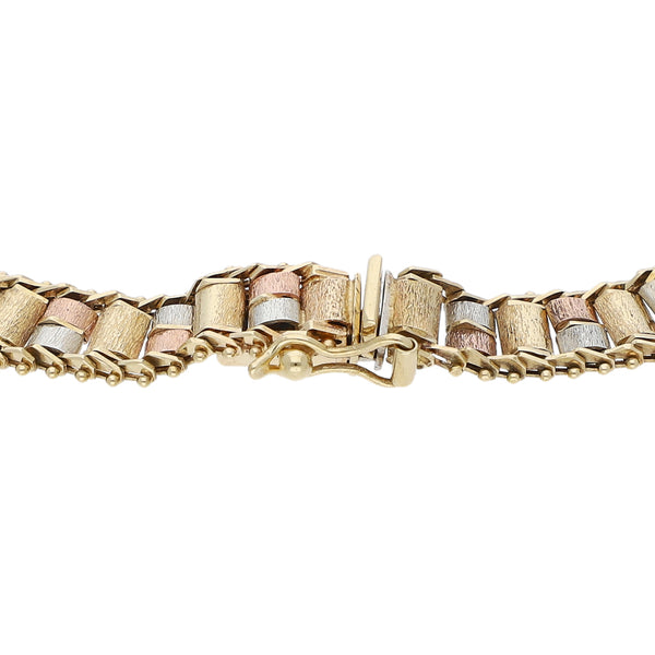 Pulsera eslabón boleado en oro tres tonos 14 kilates.