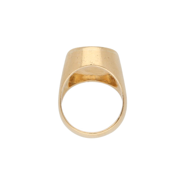 Anillo tipo sello con sintético en oro amarillo 18 kilates.