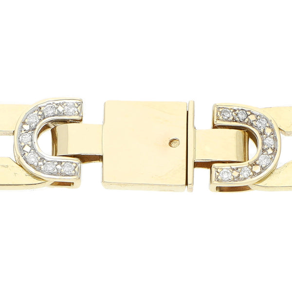 Pulsera eslabón articulado con diamantes en oro amarillo 14 kilates.