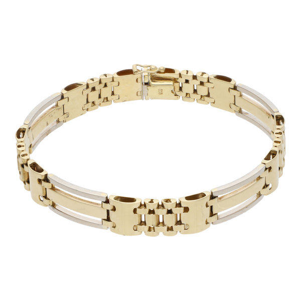 Pulsera eslabón articulado en oro dos tonos 14 kilates.