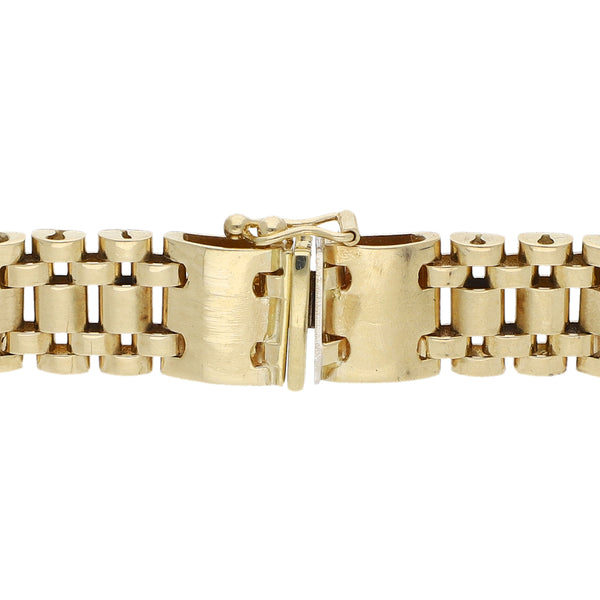 Pulsera eslabón articulado en oro dos tonos 14 kilates.