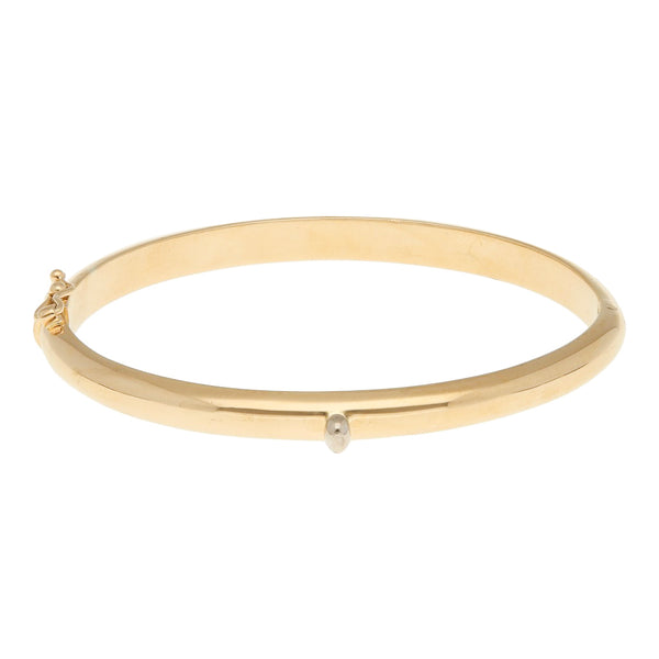 Pulsera de arillo articulada firma Tane en oro amarillo 18 kilates