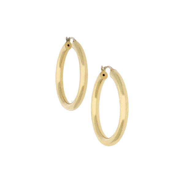 Arracadas huecas en oro amarillo 18 kilates.