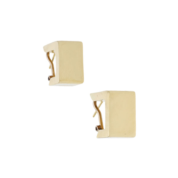 Aretes estilizados en oro amarillo 14 kilates.