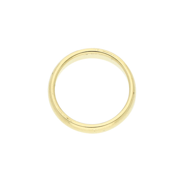 Argolla lisa firma Tiffany & Co. en oro amarillo 18 kilates.