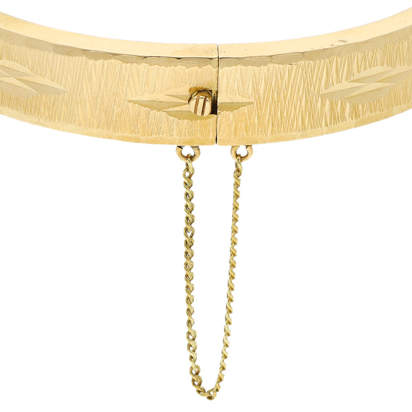 Pulsera de arillo articulada en oro amarillo 18 kilates.