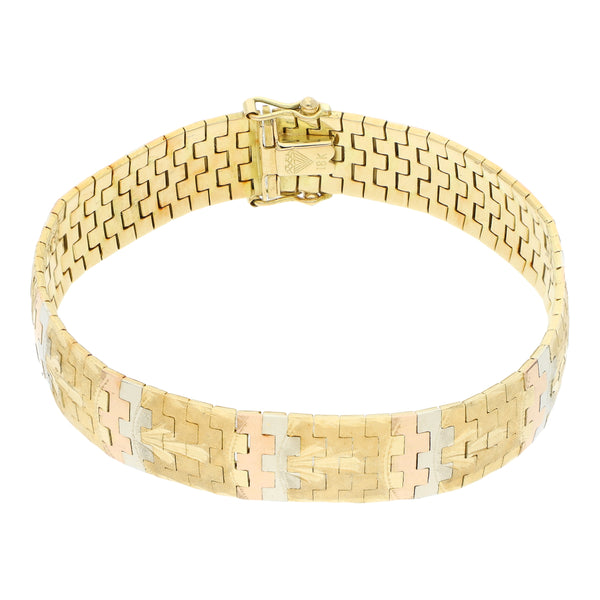 Pulsera eslabón laminado en oro tres tonos 18 kilates.