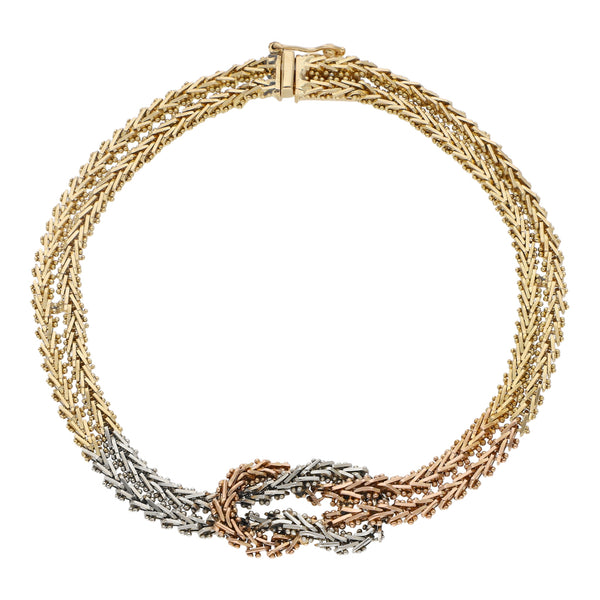Pulsera de dos hilos eslabón boleado en oro tres tonos 18 kilates.