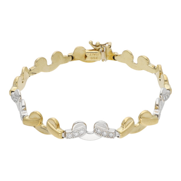 Pulsera eslabón articulado con sintéticos en oro dos tonos 18 kilates.