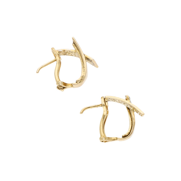 Aretes estilizados con sintéticos en oro amarillo 12 kilates.