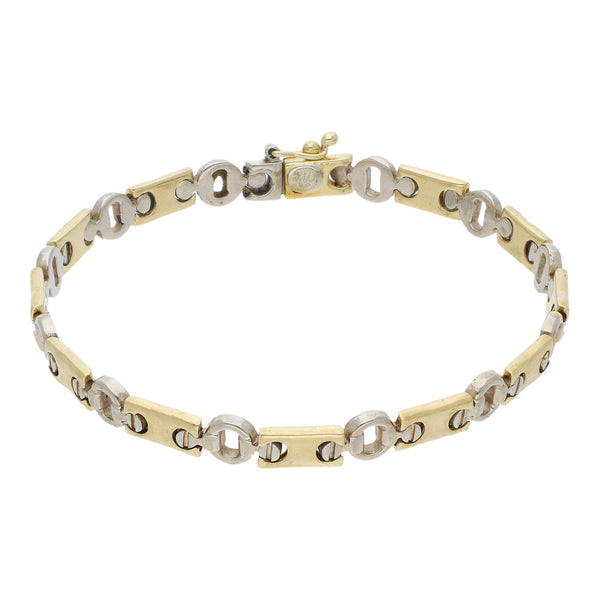 Pulsera eslabón articulado en oro dos tonos 14 kilates.