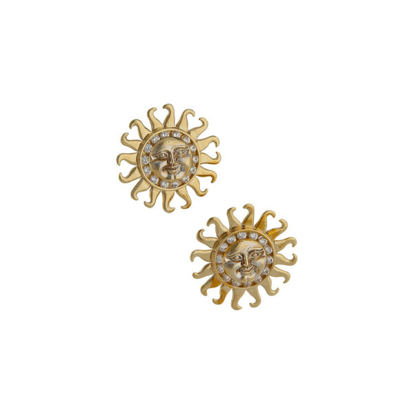 Aretes diseño especial motivo sol con circonias en oro amarillo 14 kilates.