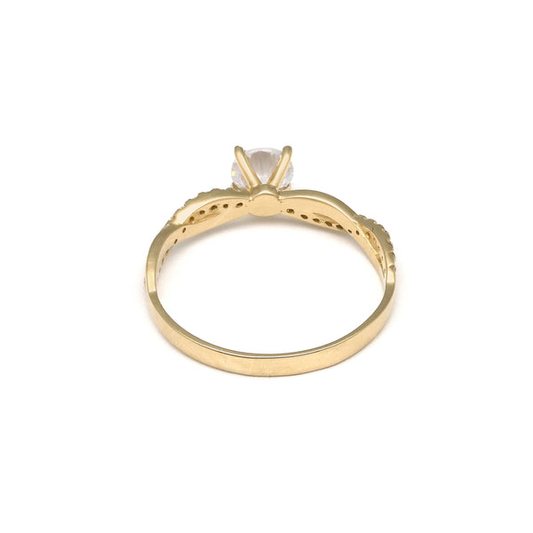 Anillo diseño especial con circonias en oro amarillo 14 kilates.