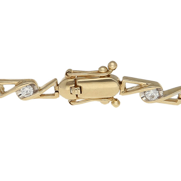 Pulsera eslabón articulado con sintéticos en oro amarillo 14 kilates.
