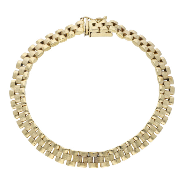 Pulsera eslabón articulado en oro amarillo 14 kilates.