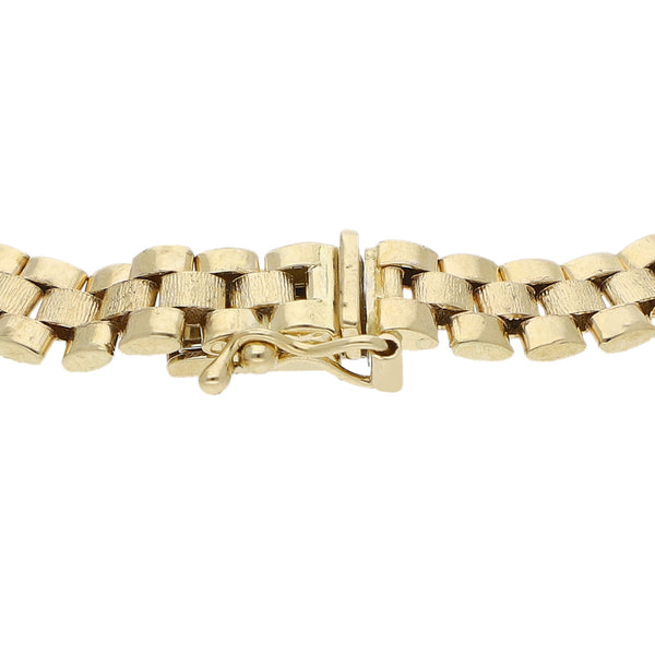 Pulsera eslabón articulado en oro amarillo 14 kilates.