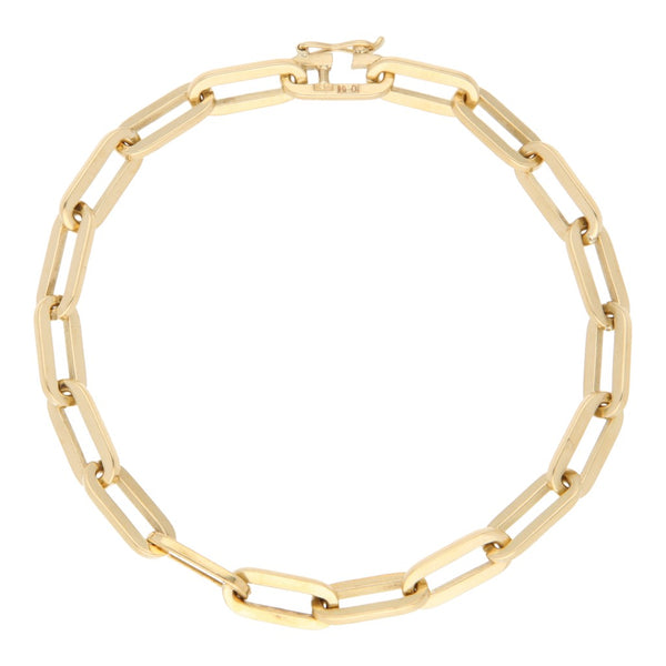 Pulsera eslabón cruzado en oro amarillo 18 kilates.