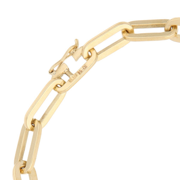 Pulsera eslabón cruzado en oro amarillo 18 kilates.
