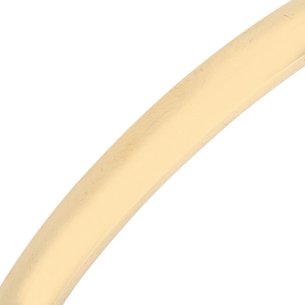 Pulsera de arillo facetada en oro amarillo 18 kilates.