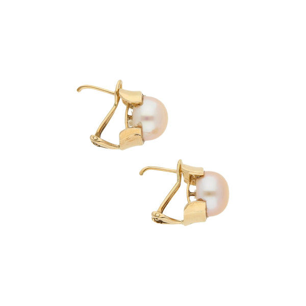 Aretes diseño especial con sintéticos en oro amarillo 14 kilates.