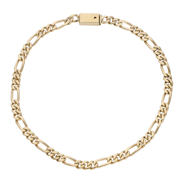 Pulsera de tres eslabones por uno en oro amarillo 14 kilates.