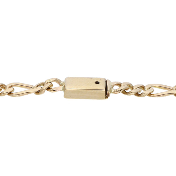 Pulsera de tres eslabones por uno en oro amarillo 14 kilates.