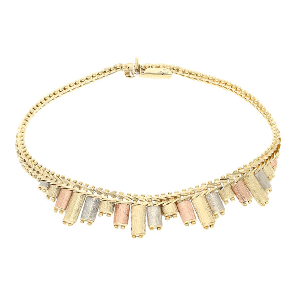 Pulsera eslabón boleado con aplicaciones en oro tres tonos 14 kilates.