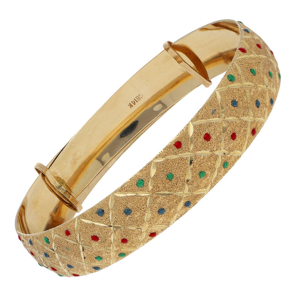 Pulsera de arillo labrada con esmalte en oro amarillo 14 kilates.
