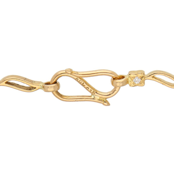 Pulsera eslabón articulado con circonias en oro amarillo 22 kilates.