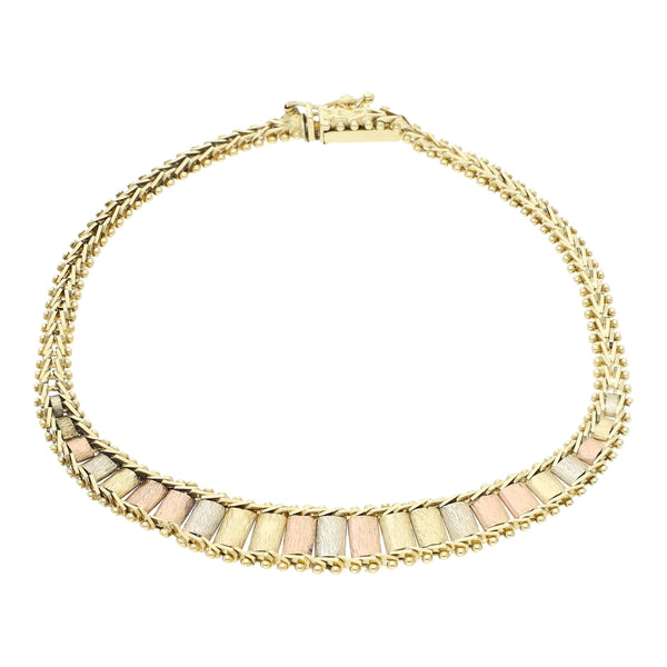 Pulsera eslabón boleado en oro tres tonos 14 kilates.