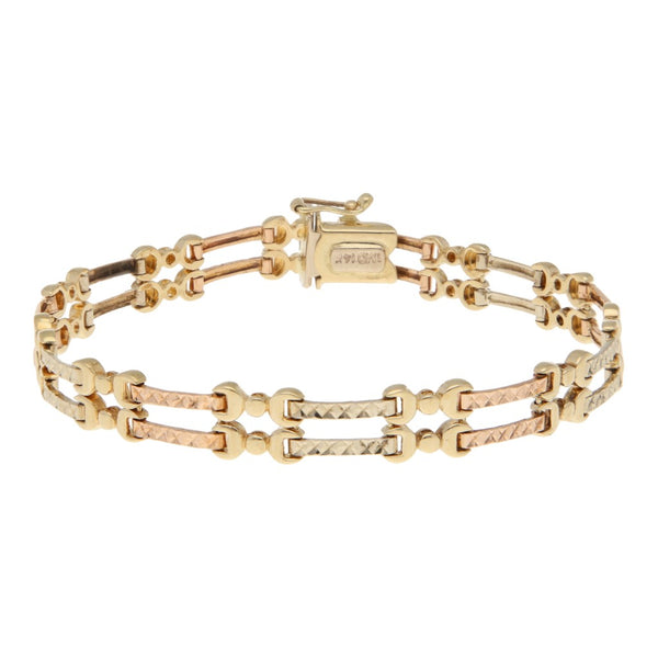 Pulsera eslabón articulado en oro tres tonos 14 kilates.