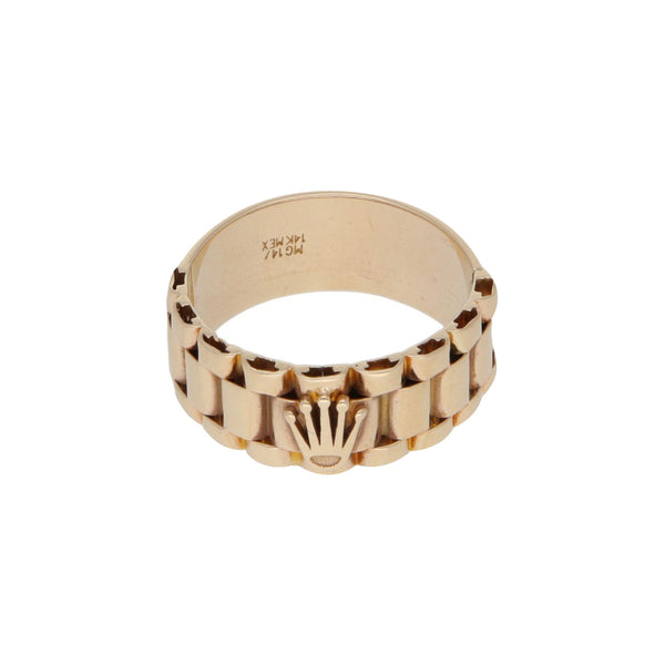 Anillo diseño especial con aplicación motivo corona en oro amarillo 14 kilates.