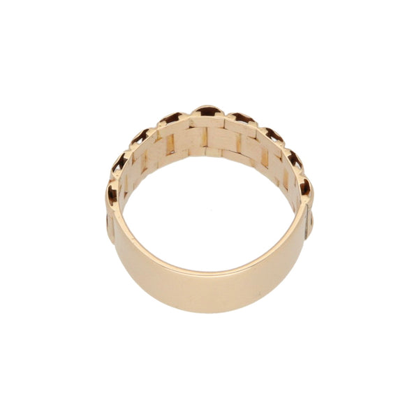 Anillo diseño especial con aplicación motivo corona en oro amarillo 14 kilates.