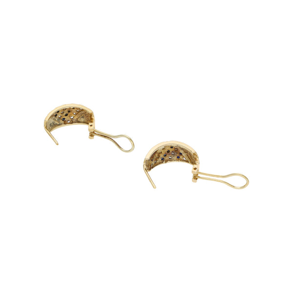 Juego anillo y aretes diseño especial con sintéticos en oro amarillo 14 kilates.