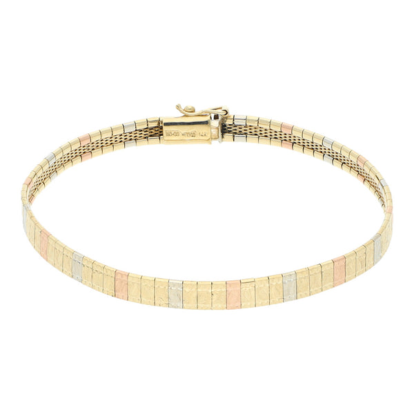 Pulsera eslabón laminado en oro tres tonos 14 kilates.