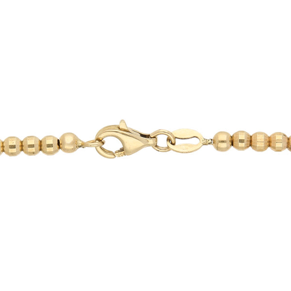 Pulsera eslabón cuadrado cruzado con aplicaciones en oro dos tonos 14 kilates.