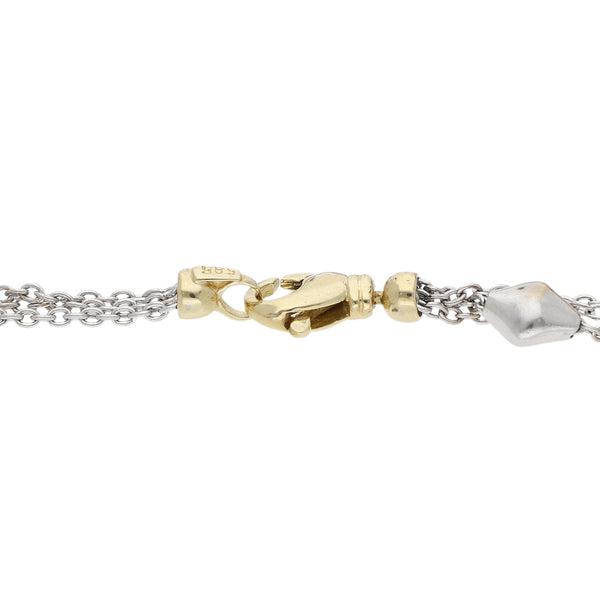 Pulsera de tres hilos eslabón cruzado con aplicaciones de corazón y rombos en oro dos tonos 14 kilates.