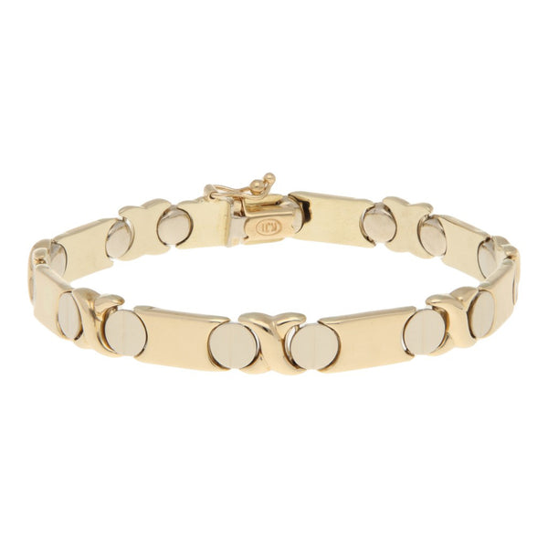 Pulsera eslabón articulado motivo tornillos en oro dos tonos 14 kilates.